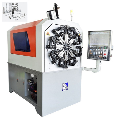 Ressort automatique faisant la machine, came de commande numérique par ordinateur guide la machine avec le fil rotatoire
