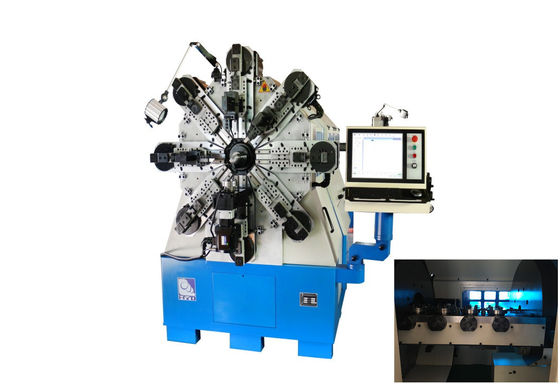 Systèmes de sortie de bobine multiaxes rapides pour machine à ressort CNC à douze axes