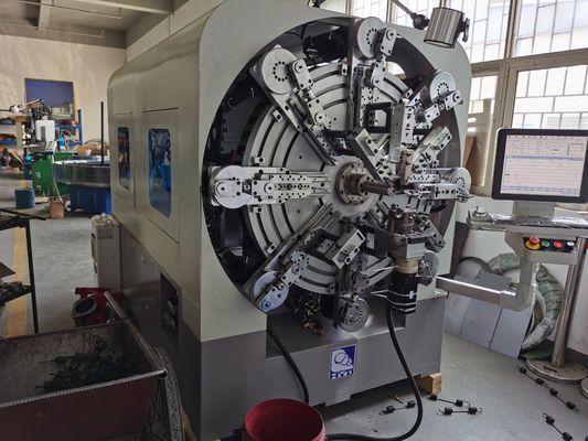 Machine multifonctionnelle de lovage de ressort de commande numérique par ordinateur avec des systèmes de bobine de rotation de fil